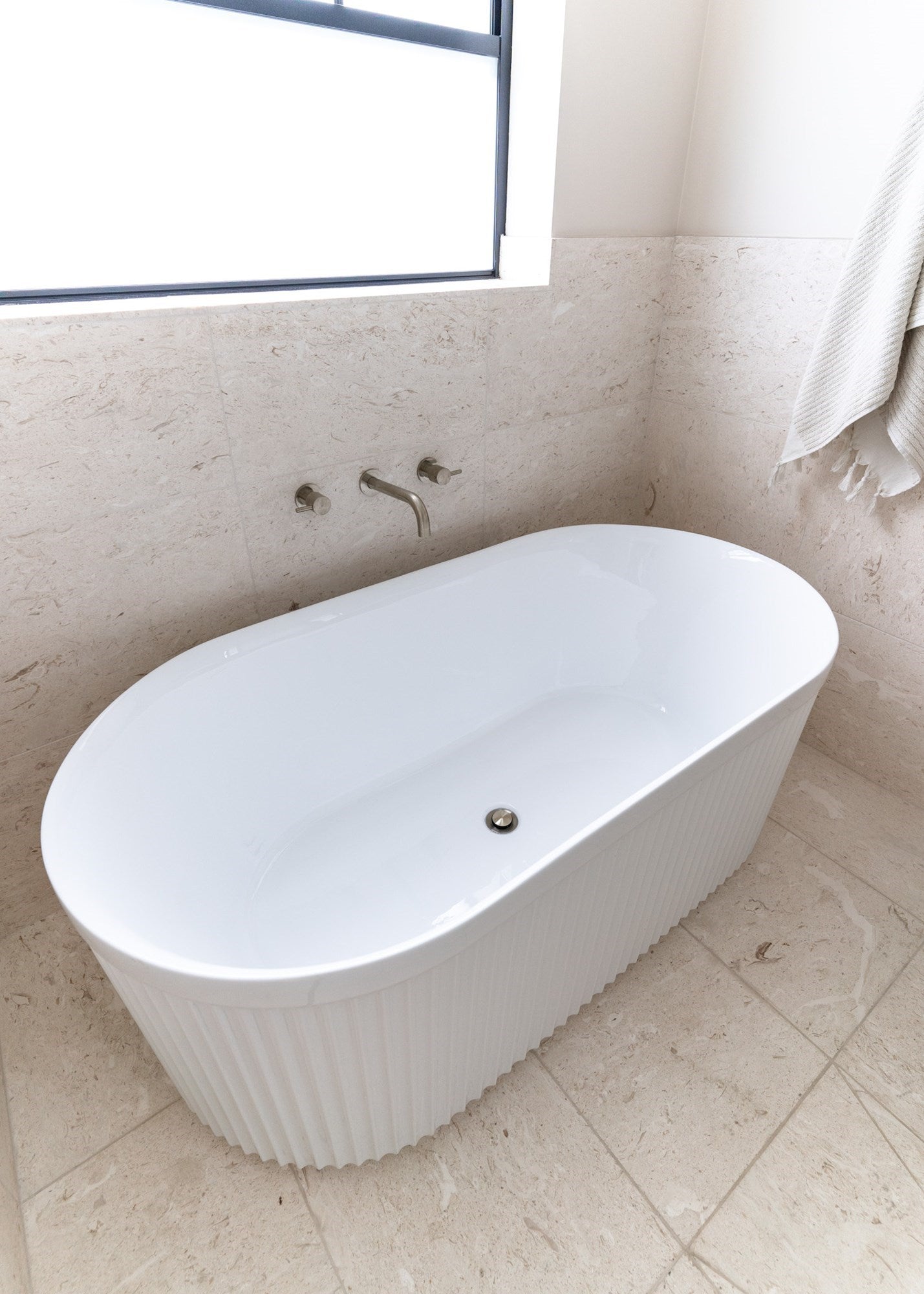 Bronte - Modern freestanding bath with fluted detailing