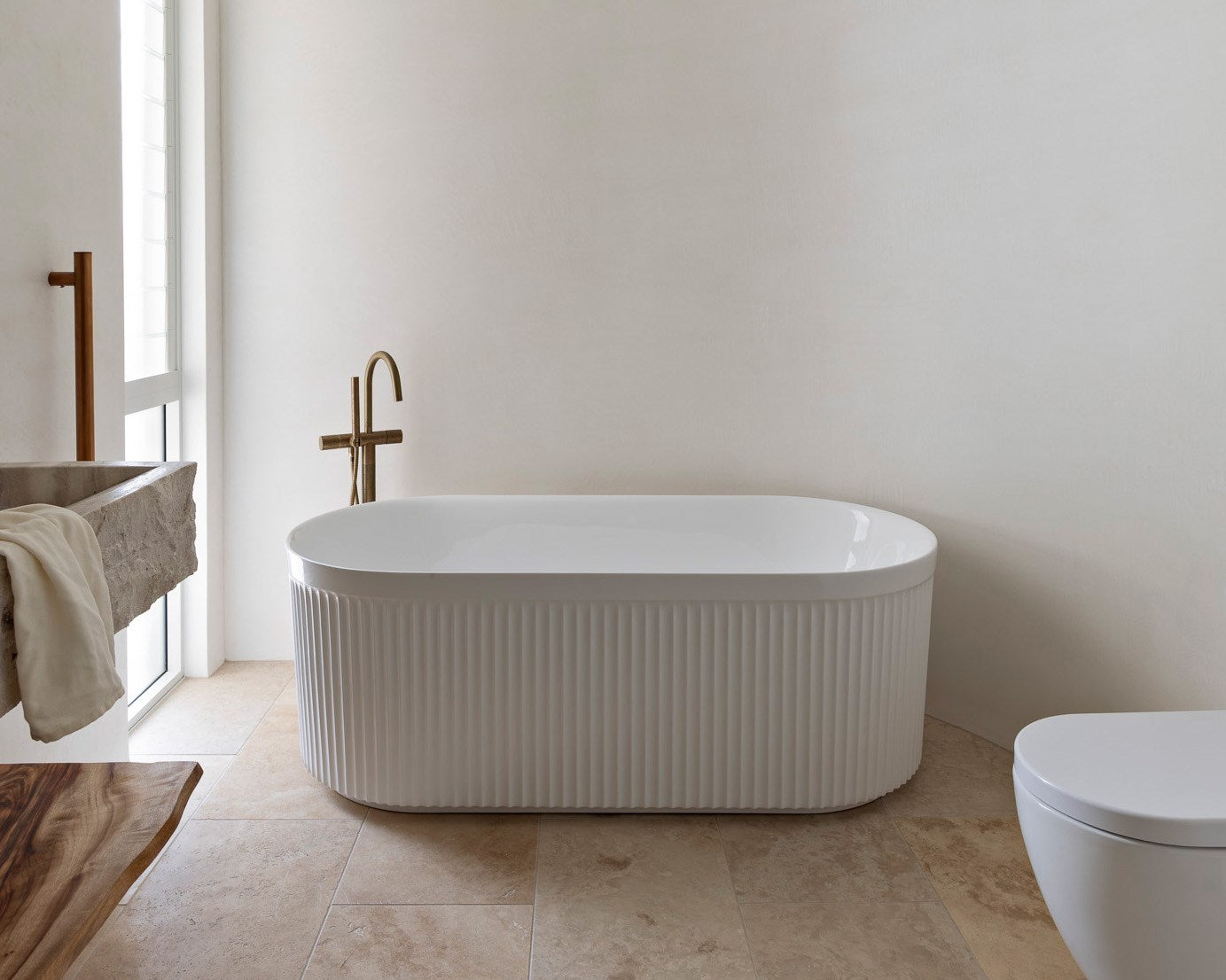 Bronte - Modern freestanding bath with fluted detailing